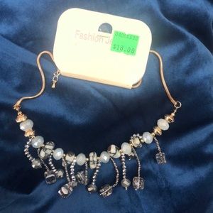 Pretty silver, gold, and white, dangling necklace